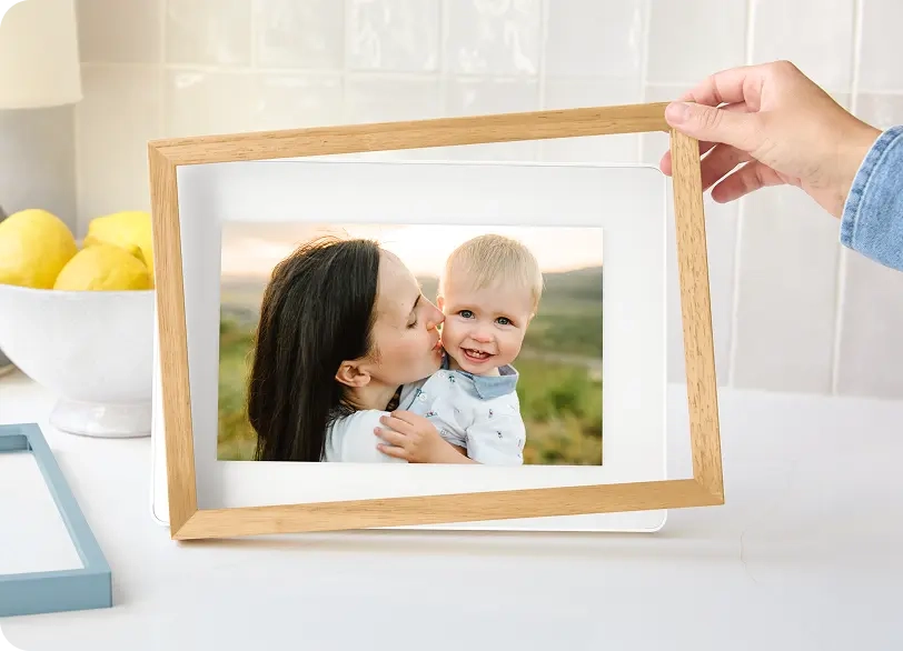 Skylight Calendar 15" on a countertop with a plant and bookcase in the background